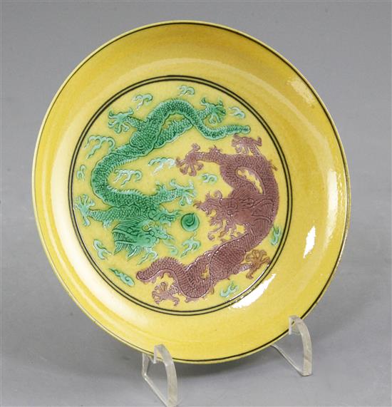 A Chinese yellow glazed dragon saucer dish, Guangxu mark and of the period (1875-1908), diameter 13cm